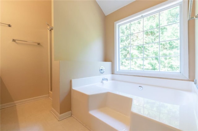 5425 Windswept Trce, Sugar Hill, GA 30518 - full bath featuring a bath, a shower, and lofted ceiling