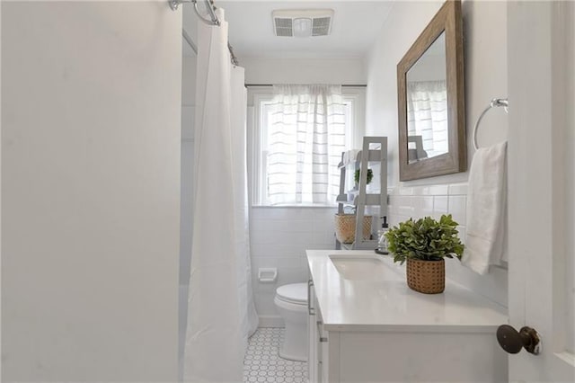 1631 Dresden Dr NE, Brookhaven, GA 30319 - bathroom with vanity, tile patterned flooring, and a shower with curtain