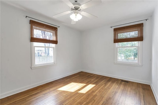 1631 Dresden Dr NE, Brookhaven, GA 30319 - empty room featuring hardwood / wood-style floors and ceiling fan