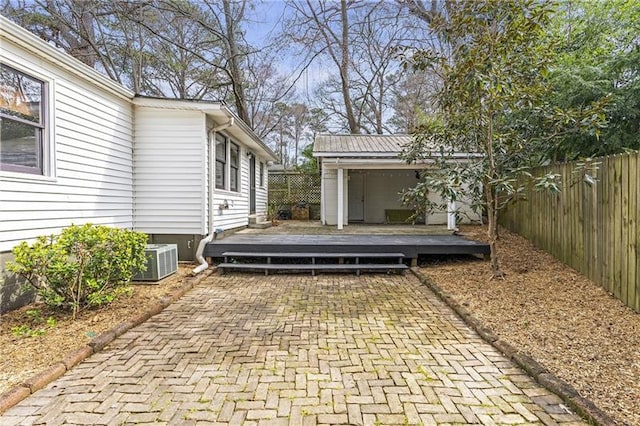 1631 Dresden Dr NE, Brookhaven, GA 30319 - fenced backyard with a wooden deck and an outdoor structure