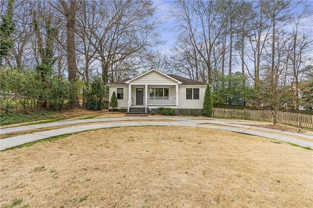 1631 Dresden Dr NE, Brookhaven, GA 30319 - view of front facade with covered porch and curved driveway