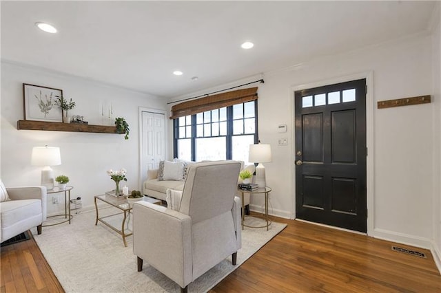 1631 Dresden Dr NE, Brookhaven, GA 30319 - living area with ornamental molding, hardwood / wood-style flooring, and recessed lighting