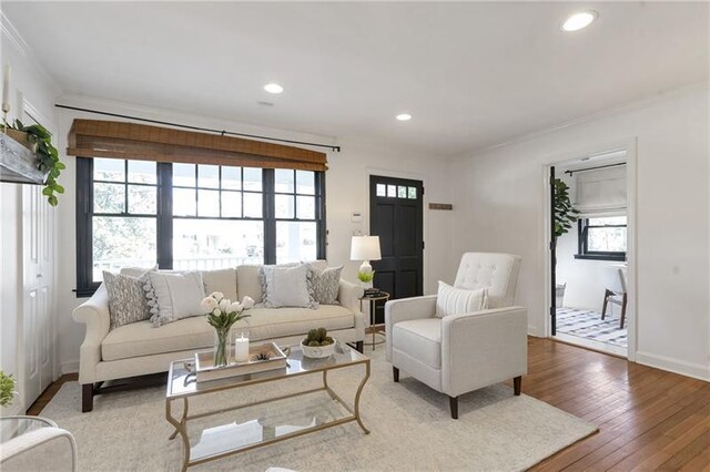 1631 Dresden Dr NE, Brookhaven, GA 30319 - living area featuring hardwood / wood-style flooring, recessed lighting, and ornamental molding