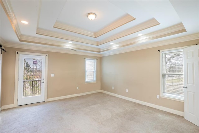 1137 Fortress Ave SW, Atlanta, GA 30315 - unfurnished room with light carpet, a raised ceiling, ornamental molding, recessed lighting, and baseboards