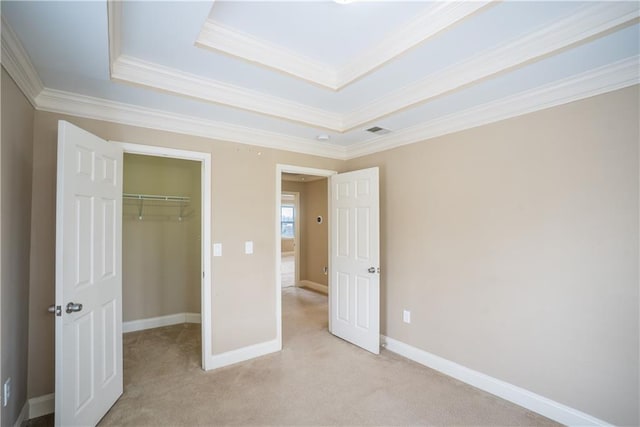 1137 Fortress Ave SW, Atlanta, GA 30315 - unfurnished bedroom with a walk in closet, light colored carpet, visible vents, and baseboards