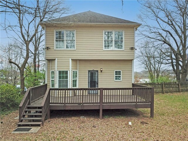 1137 Fortress Ave SW, Atlanta, GA 30315 - rear view of house featuring roof with shingles, a deck, and fence