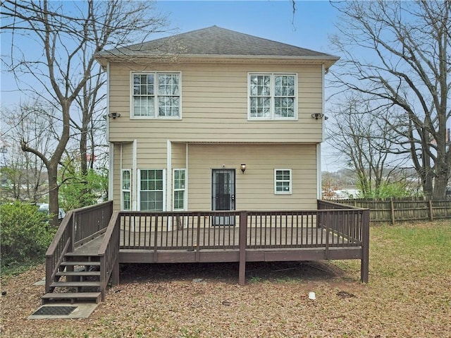 1137 Fortress Ave SW, Atlanta, GA 30315 - rear view of property featuring roof with shingles, a deck, and fence
