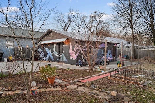 view of front of property with a patio