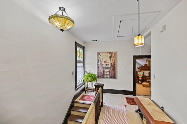 corridor with light wood-type flooring