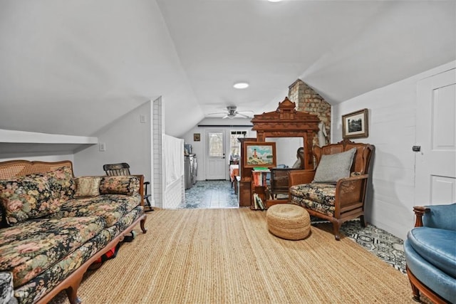 interior space with lofted ceiling and ceiling fan