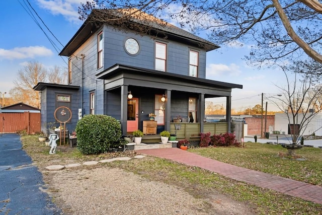 view of front of property featuring covered porch