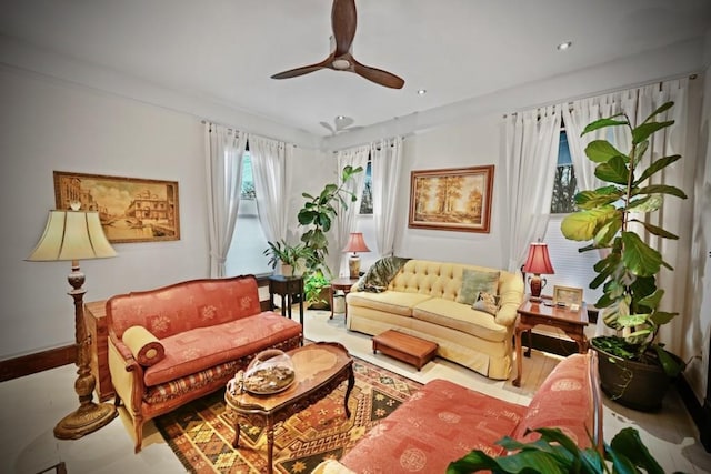 sitting room with ceiling fan