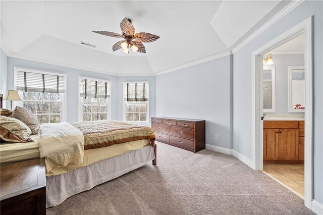 bedroom featuring crown molding, visible vents, carpet, and multiple windows