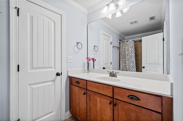 bathroom featuring visible vents, vanity, a shower with shower curtain, and crown molding