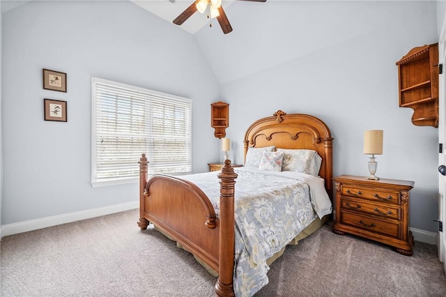 carpeted bedroom with vaulted ceiling, baseboards, and ceiling fan