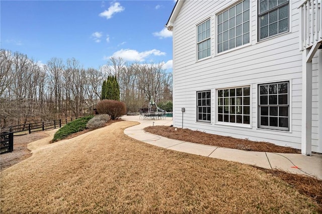 view of yard featuring a patio area and fence