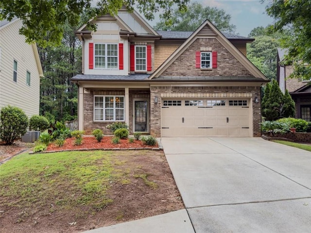 750 Summerstone Ln, Lawrenceville, GA 30044 - craftsman-style home with driveway, a garage, brick siding, and central AC