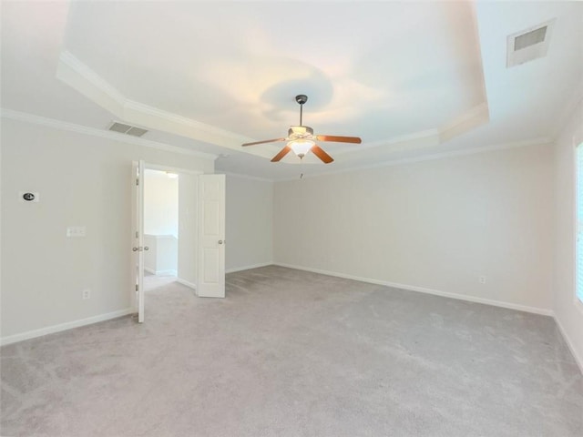 750 Summerstone Ln, Lawrenceville, GA 30044 - unfurnished room featuring ornamental molding, ceiling fan, light carpet, baseboards, and a tray ceiling