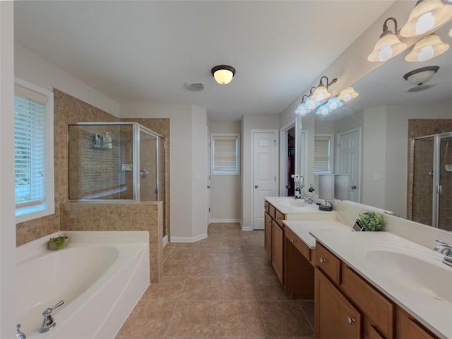 750 Summerstone Ln, Lawrenceville, GA 30044 - full bathroom featuring a shower stall, double vanity, a bath, tile patterned floors, and baseboards