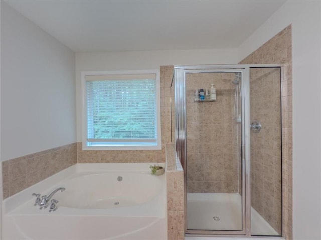 750 Summerstone Ln, Lawrenceville, GA 30044 - bathroom featuring a bath and a stall shower