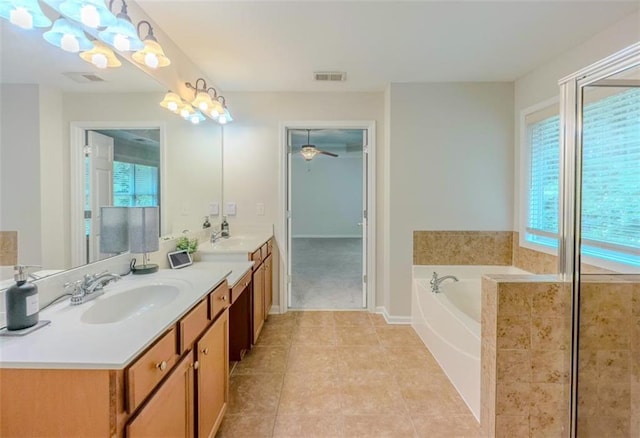 750 Summerstone Ln, Lawrenceville, GA 30044 - bathroom with a bath, double vanity, tile patterned floors, and ceiling fan