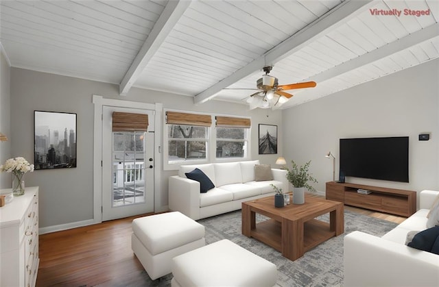 living room with ceiling fan, beam ceiling, and light wood-type flooring