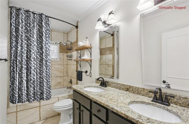 full bathroom featuring ornamental molding, toilet, vanity, and shower / bath combo