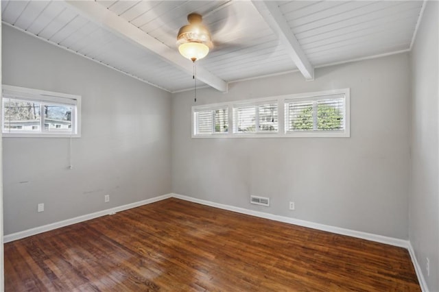 spare room featuring ceiling fan, dark hardwood / wood-style flooring, and lofted ceiling with beams