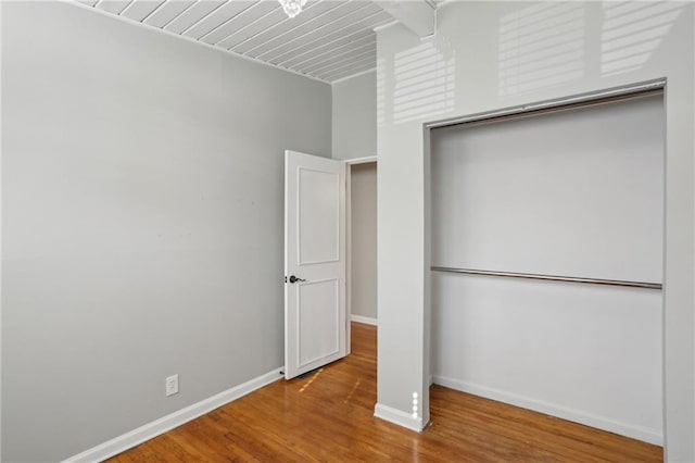 unfurnished bedroom featuring wood-type flooring