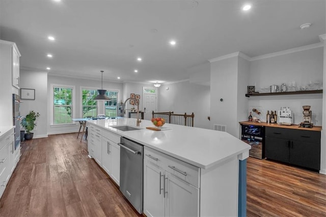 2066 Patterson Park Rd, Decatur, GA 30033 - kitchen featuring dishwasher, ornamental molding, a sink, light countertops, and an island with sink