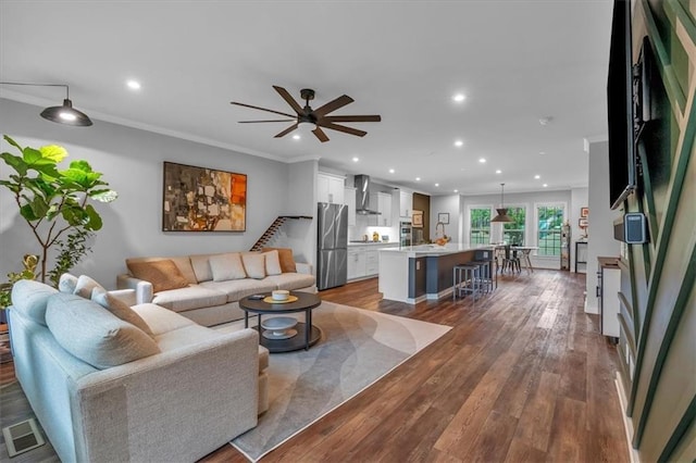 2066 Patterson Park Rd, Decatur, GA 30033 - living room featuring recessed lighting, ceiling fan, ornamental molding, and wood finished floors