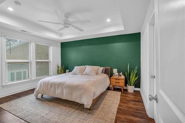 2066 Patterson Park Rd, Decatur, GA 30033 - bedroom featuring a tray ceiling, dark wood-type flooring, baseboards, recessed lighting, and ceiling fan