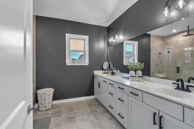 2066 Patterson Park Rd, Decatur, GA 30033 - bathroom with a stall shower, double vanity, plenty of natural light, and baseboards