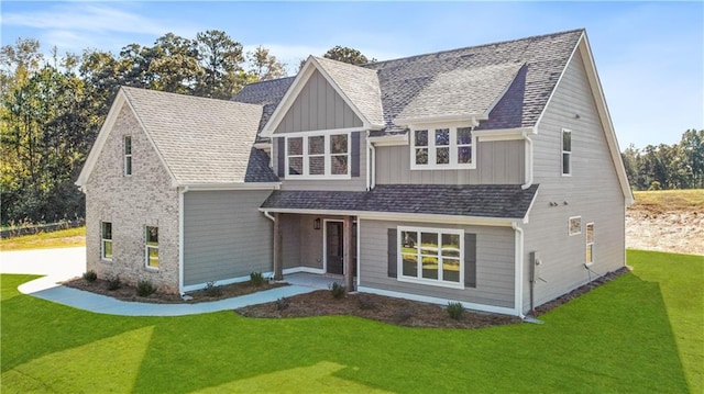 102 Red Oak Ln, Carrollton, GA 30116 - view of front facade with board and batten siding and a front lawn