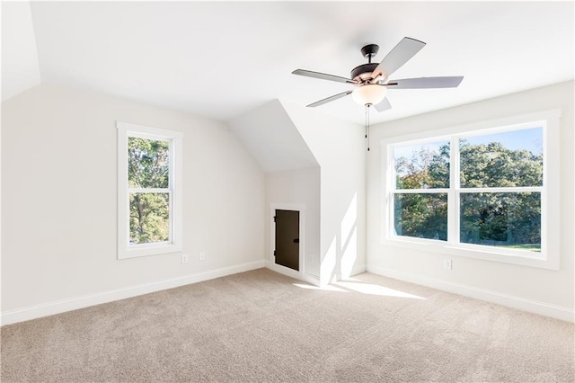 102 Red Oak Ln, Carrollton, GA 30116 - additional living space with vaulted ceiling, carpet floors, and a ceiling fan