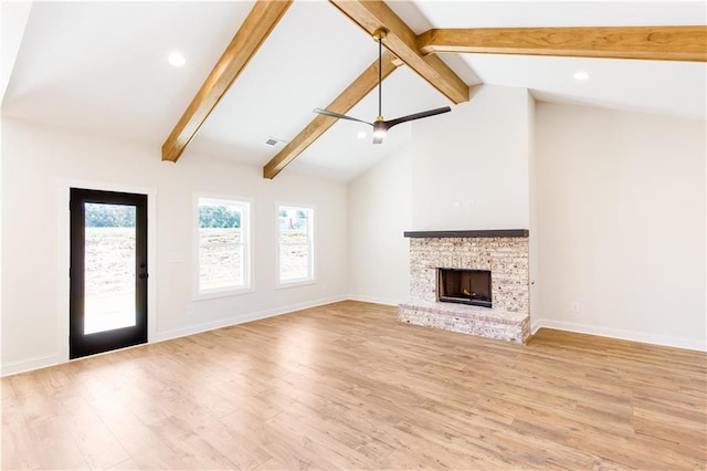 102 Red Oak Ln, Carrollton, GA 30116 - unfurnished living room featuring light wood-style flooring, a fireplace, and recessed lighting