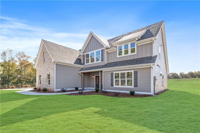 102 Red Oak Ln, Carrollton, GA 30116 - view of front of property with a front yard and board and batten siding