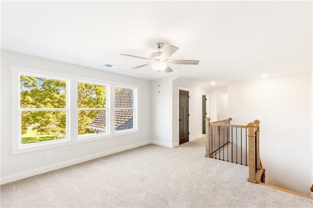 102 Red Oak Ln, Carrollton, GA 30116 - empty room featuring carpet, plenty of natural light, ceiling fan, and recessed lighting