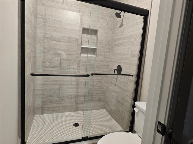 8970 Callaway Dr, Winston, GA 30187 - bathroom featuring a stall shower and toilet