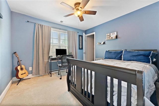 525 Roland Manor Dr, Dacula, GA 30019 - bedroom featuring light colored carpet, an office area, baseboards, and ceiling fan