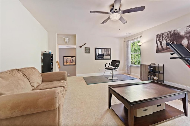 525 Roland Manor Dr, Dacula, GA 30019 - living room featuring carpet floors, a ceiling fan, built in shelves, and baseboards