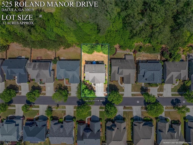 525 Roland Manor Dr, Dacula, GA 30019 - aerial view of residential area featuring property parcel outlined
