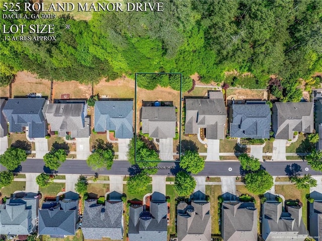 525 Roland Manor Dr, Dacula, GA 30019 - aerial view of residential area featuring property parcel outlined