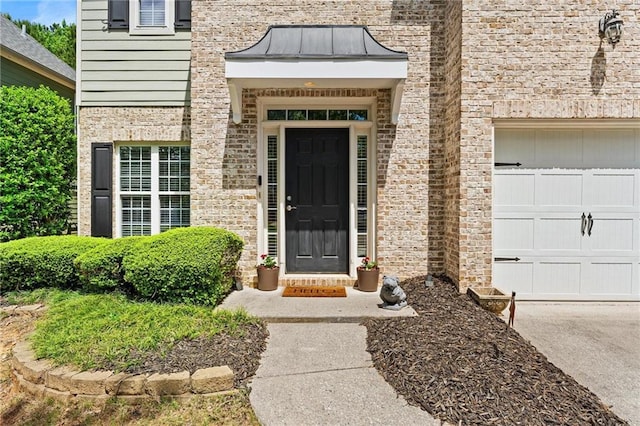525 Roland Manor Dr, Dacula, GA 30019 - entrance to property with a standing seam roof and concrete driveway