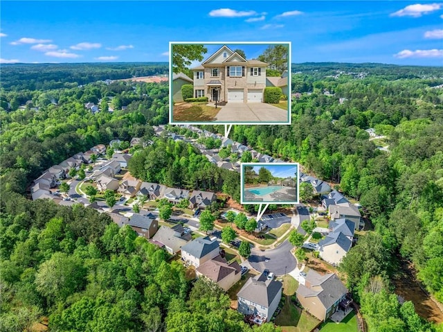 525 Roland Manor Dr, Dacula, GA 30019 - aerial view of residential area with a heavily wooded area and property parcel outlined