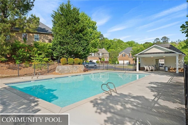 525 Roland Manor Dr, Dacula, GA 30019 - community pool with a patio area and a residential view