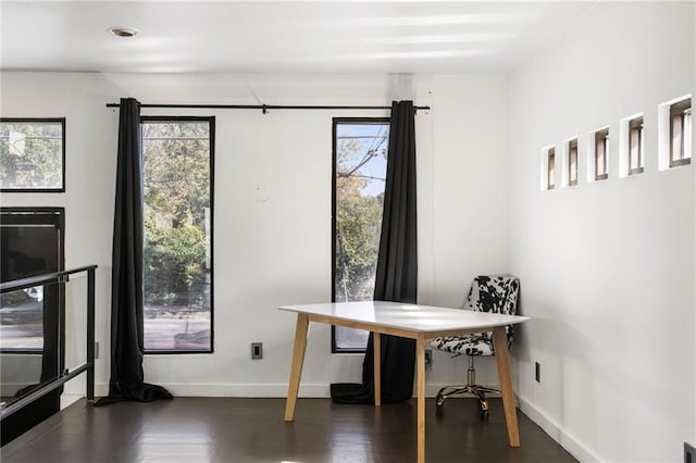 office space featuring dark wood-type flooring