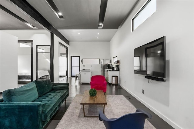 living room featuring dark wood-type flooring