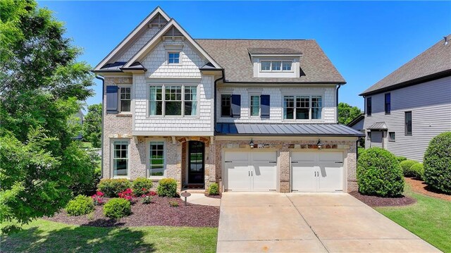 3910 Cameron Ct, Cumming, GA 30040 - view of front of house with driveway, an attached garage, a standing seam roof, a shingled roof, and brick siding