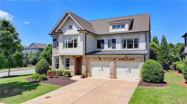3910 Cameron Ct, Cumming, GA 30040 - view of front of property with driveway, an attached garage, a front lawn, a standing seam roof, and roof with shingles